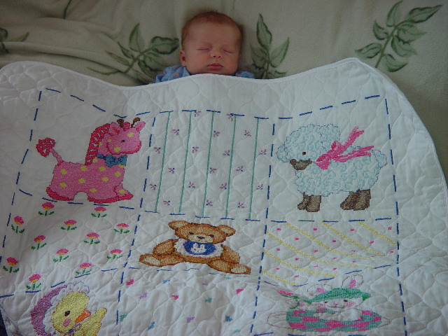 Pierce's quilt made by Aunt Pam