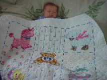 Pierce's quilt made by Aunt Pam